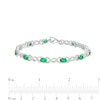 Thumbnail Image 3 of Oval Lab-Created Emerald and 0.18 CT. T.W. Diamond Infinity Ribbon Link Line Bracelet in Sterling Silver – 7.5"