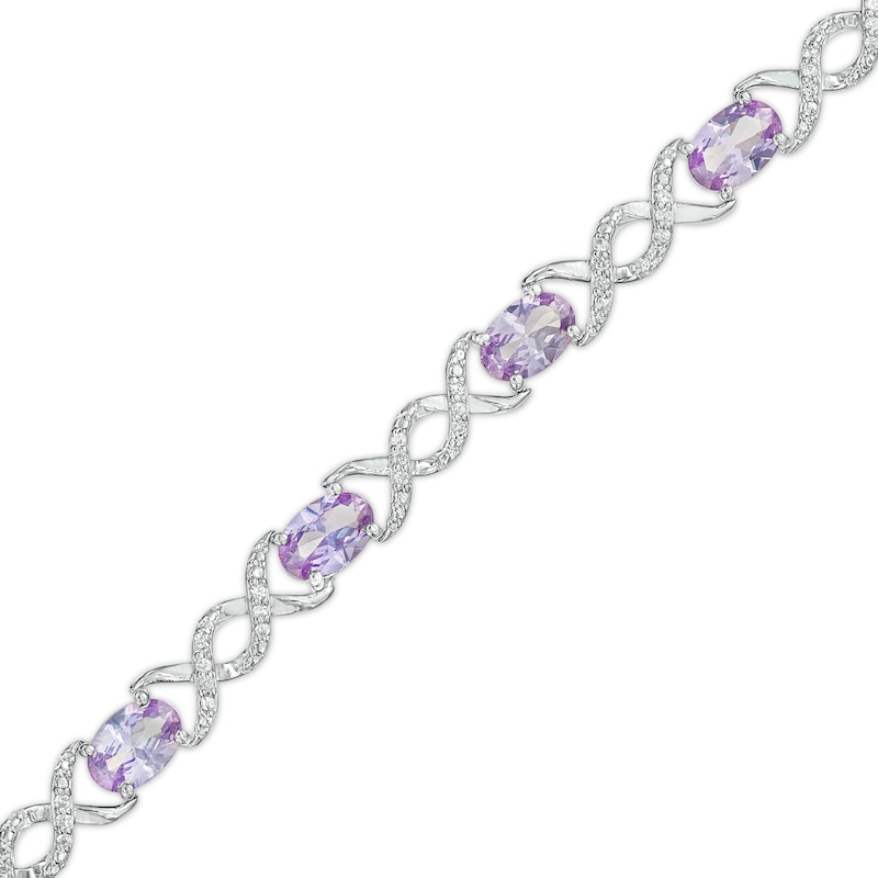 Oval Lab-Created Alexandrite and 0.18 CT. T.W. Diamond Infinity Ribbon Link Line Bracelet in Sterling Silver – 7.5"|Peoples Jewellers