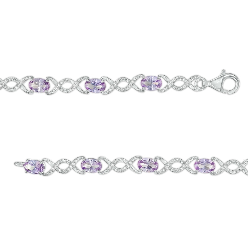 Oval Lab-Created Alexandrite and 0.18 CT. T.W. Diamond Infinity Ribbon Link Line Bracelet in Sterling Silver – 7.5"|Peoples Jewellers