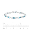 Thumbnail Image 3 of Oval Blue Topaz and 0.18 CT. T.W. Diamond Infinity Ribbon Link Line Bracelet in Sterling Silver – 7.5"
