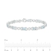 Thumbnail Image 3 of Oval Aquamarine and 0.18 CT. T.W. Diamond Infinity Ribbon Link Line Bracelet in Sterling Silver – 7.5"