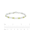 Thumbnail Image 3 of Oval Peridot and 0.18 CT. T.W. Diamond Infinity Ribbon Link Line Bracelet in Sterling Silver – 7.5"