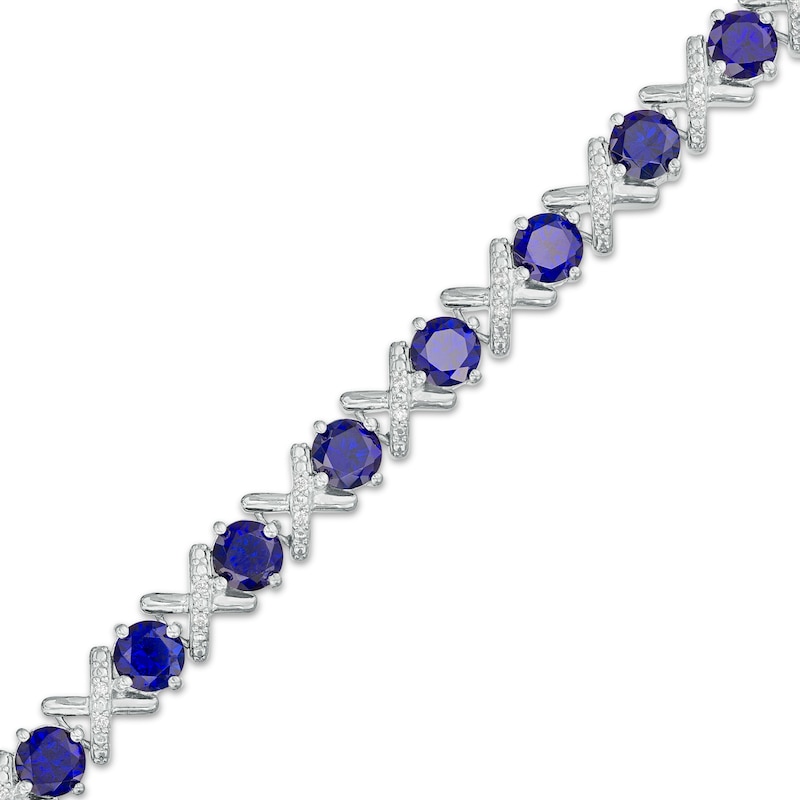 4.5mm Blue Lab-Created Sapphire and 0.14 CT. T.W. Diamond Alternating "XO" Line Bracelet in Sterling Silver – 7.5"