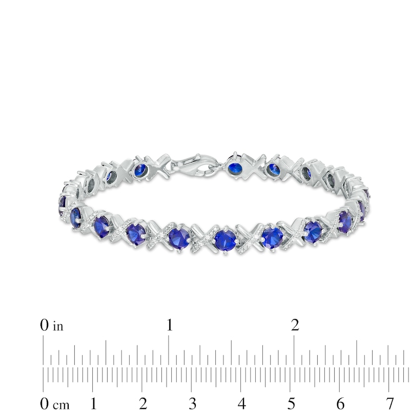 4.5mm Blue Lab-Created Sapphire and 0.14 CT. T.W. Diamond Alternating "XO" Line Bracelet in Sterling Silver – 7.5"