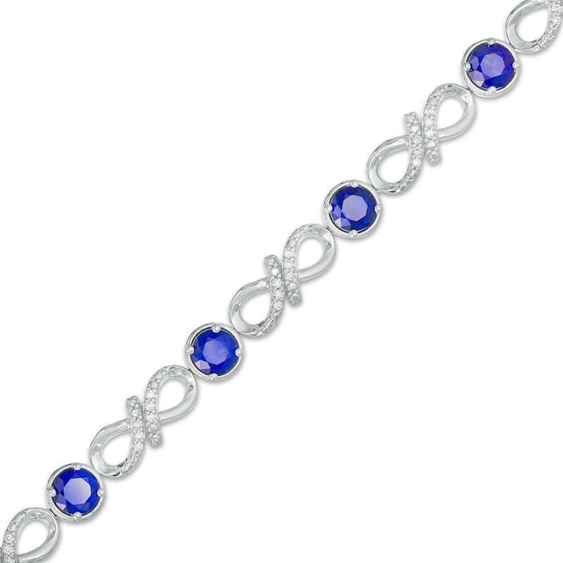 4.0mm Blue Lab-Created Sapphire and 0.15 CT. T.W. Diamond Infinity Twist Line Bracelet in Sterling Silver – 7.25"