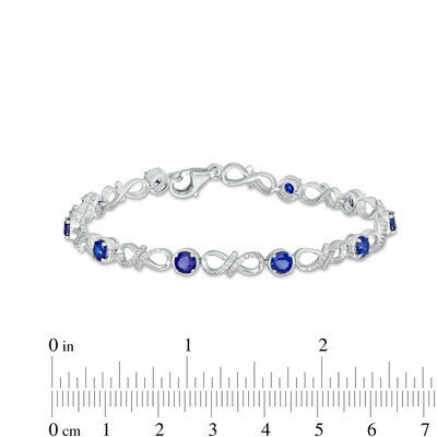 4.0mm Blue Lab-Created Sapphire and 0.15 CT. T.W. Diamond Infinity Twist Line Bracelet in Sterling Silver – 7.25"