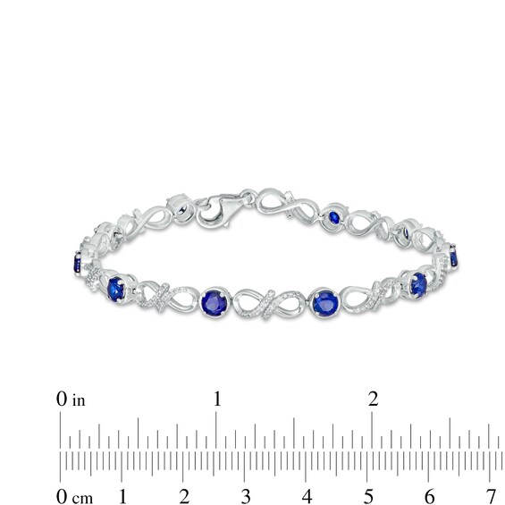 4.0mm Blue Lab-Created Sapphire and 0.15 CT. T.W. Diamond Infinity Twist Line Bracelet in Sterling Silver – 7.25"