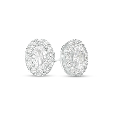 0.75 CT. T.W. Certified Canadian Oval Diamond Frame Stud Earrings in 14K White Gold (I/I2)