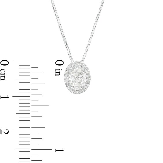 0.50 CT. T.W. Certified Canadian Oval Diamond Frame Pendant in 14K White Gold (I/I2)