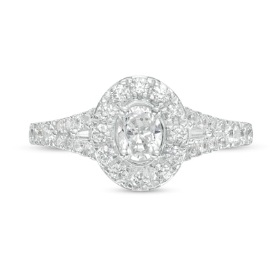 1.00 CT. T.W. Oval Diamond Frame Split Shank Engagement Ring in 14K White Gold (I/I2)