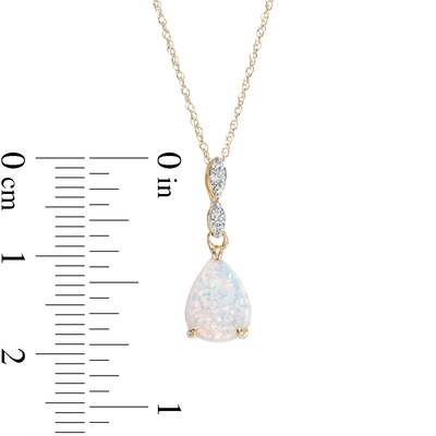 Pear-Shaped Lab-Created Opal and Diamond Accent Teardrop Pendant in 10K Gold