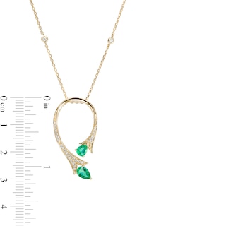 Pear-Shaped Emerald and 0.14 CT. T.W. Diamond Floral Loop Station Pendant in 10K Gold