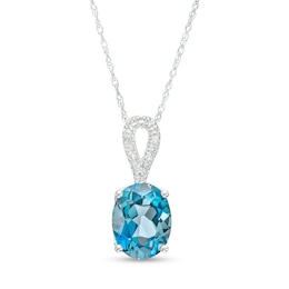 Oval London Blue Topaz and Diamond Accent Ribbon Loop Pendant in 10K White Gold