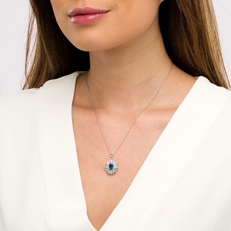 Blue Topaz and Diamond Accent Flower Petals Frame Pendant in Sterling Silver|Peoples Jewellers
