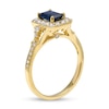 Emerald-Cut Blue Sapphire and 0.40 CT. T.W. Diamond Octagonal Frame Split Shank Buckle Ring in 10K Gold