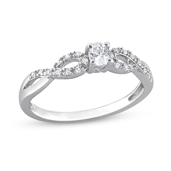 Oval White Lab-Created Sapphire and 0.08 CT. T.W. Diamond Twist Split Shank Promise Ring in Sterling Silver