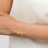 Thumbnail Image 1 of Italian Gold Oval and Briolette Cubic Zirconia Alternating Mesh Bracelet in 14K Gold – 7.5"