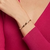 Thumbnail Image 1 of Diamond-Cut Curve Link Bracelet in 10K Two-Tone Gold – 7.25"