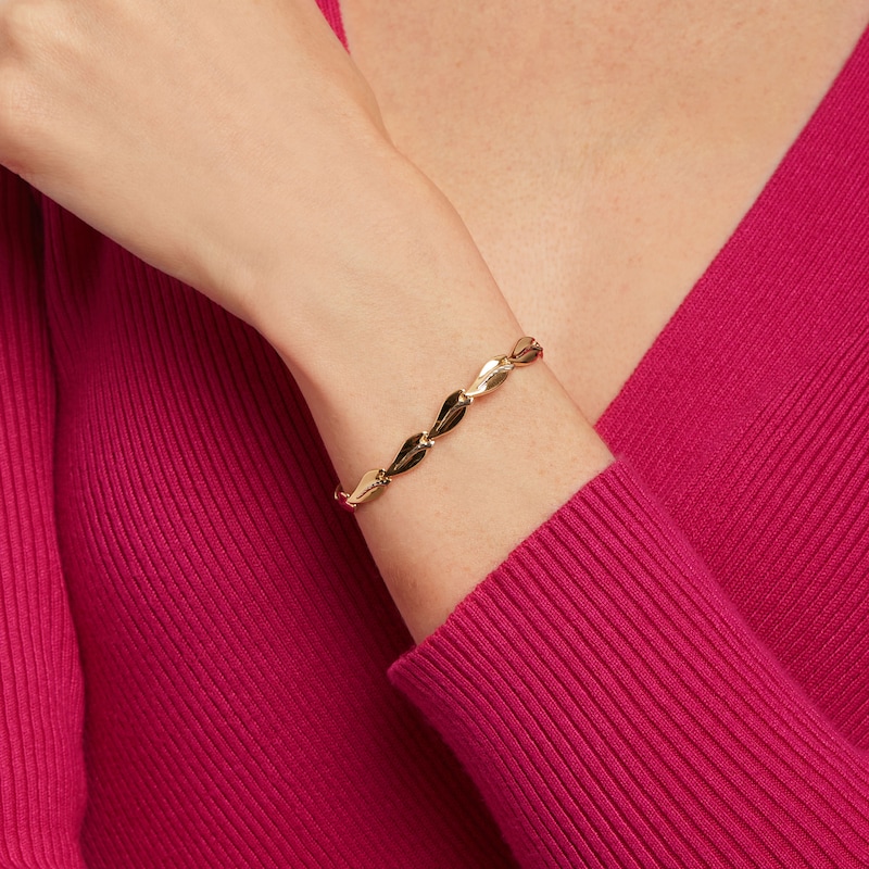 Diamond-Cut Curve Link Bracelet in 10K Two-Tone Gold – 7.25"|Peoples Jewellers