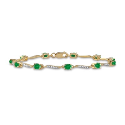 Oval Emerald and 0.16 CT. T.W. Diamond Wave Link Alternating Line Bracelet in 14K Gold – 7.25"