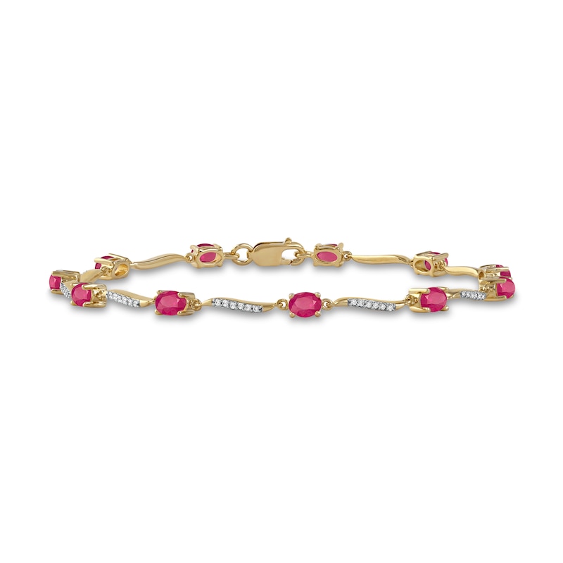Oval Ruby and 0.16 CT. T.W. Diamond Wave Link Alternating Line Bracelet in 14K Gold - 7.25"|Peoples Jewellers