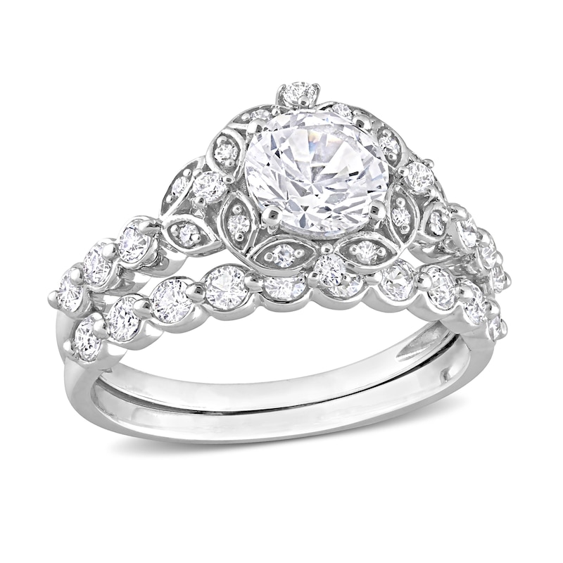 6.5mm White Lab-Created Sapphire and 0.06 CT. T.W. Diamond Flower Frame Bridal Set in 10K White Gold|Peoples Jewellers