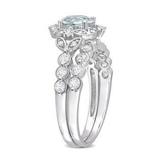 6.5mm Aquamarine, White Topaz and 0.06 CT. T.W. Diamond Flower Frame Bridal Set in 10K White Gold