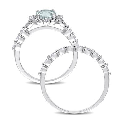 6.5mm Aquamarine, White Topaz and 0.06 CT. T.W. Diamond Flower Frame Bridal Set in 10K White Gold