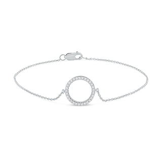 0.11 CT. T.W. Diamond Lined Circle Bracelet in 10K Gold