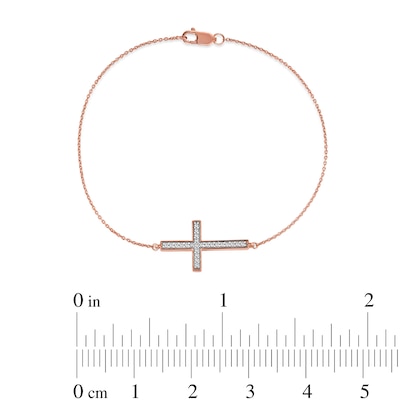 0.12 CT. T.W. Diamond Sideways Cross Bracelet in 10K Rose Gold - 7.25"