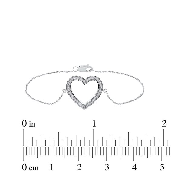 0.12 CT. T.W. Diamond Lined Heart Bracelet in 10K Gold