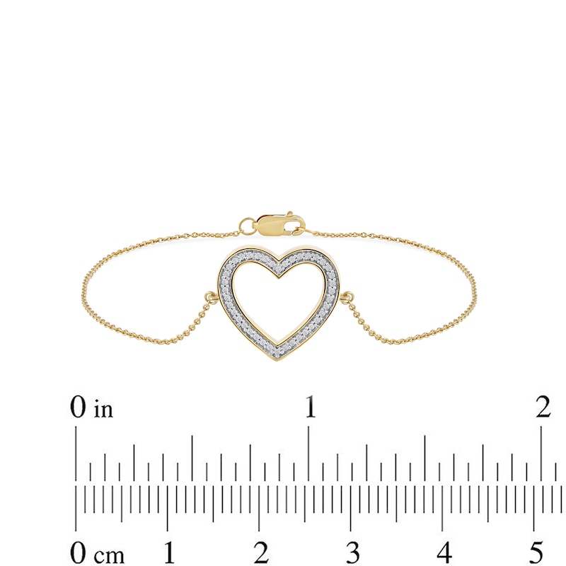 0.12 CT. T.W. Diamond Lined Heart Bracelet in 10K Gold - 7.25"