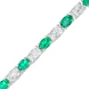 Thumbnail Image 0 of Oval Lab-Created Emerald and Cushion-Cut White Lab-Created Sapphire Alternating Line Bracelet in Sterling Silver – 7.25"