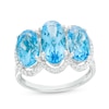 Thumbnail Image 0 of Oval Swiss Blue Topaz and 0.149 CT. T.W. Diamond Frame Trio Ring in 10K White Gold