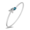 Thumbnail Image 0 of Enchanted Disney Cinderella Pear-Shaped London Blue Topaz and 0.065 CT. T.W. Diamond Carriage Bangle in Sterling Silver
