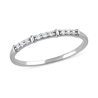 0.08 CT. T.W. Diamond Trio Nine Stone Band in 10K Gold