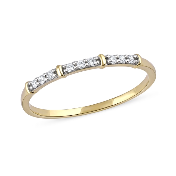 0.08 CT. T.W. Diamond Trio Nine Stone Band in 10K Gold