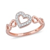 0.05 CT. T.W. Diamond Five Tilted Open Heart Ring in Sterling Silver with 14K Rose Gold Plate