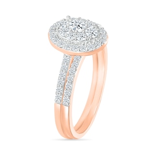 0.96 CT. T.W. Oval-Shaped Multi-Diamond Frame Bridal Set in 10K Rose Gold