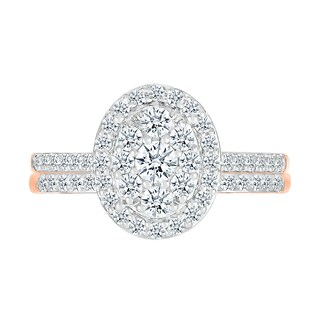 0.96 CT. T.W. Oval-Shaped Multi-Diamond Frame Bridal Set in 10K Rose Gold