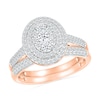 0.95 CT. T.W. Oval-Shaped Multi-Diamond Double Frame Bridal Set in 10K Rose Gold