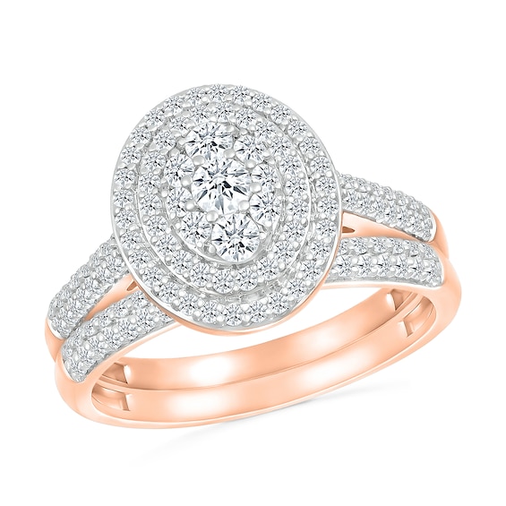 0.95 CT. T.W. Oval-Shaped Multi-Diamond Double Frame Bridal Set in 10K Rose Gold