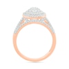 0.95 CT. T.W. Oval-Shaped Multi-Diamond Double Frame Bridal Set in 10K Rose Gold