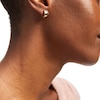 Thumbnail Image 1 of 12.0mm Huggie Hoop Earrings in 10K Gold