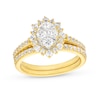 Thumbnail Image 0 of 0.95 CT. T.W. Oval-Shaped Multi-Diamond Flower Frame Bridal Set in 10K Gold (J/I3)