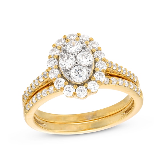 0.95 CT. T.W. Oval-Shaped Multi-Diamond Frame Bridal Set in 10K Gold (J/I3)