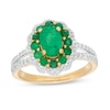 Oval Emerald and 0.25 CT. T.W. Diamond Double Scallop Frame Ring in 10K Gold