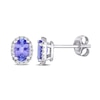 Thumbnail Image 0 of Oval Tanzanite and 0.08 CT. T.W. Diamond Frame Stud Earrings in 10K White Gold