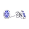 Oval Tanzanite and 0.08 CT. T.W. Diamond Frame Stud Earrings in 10K White Gold