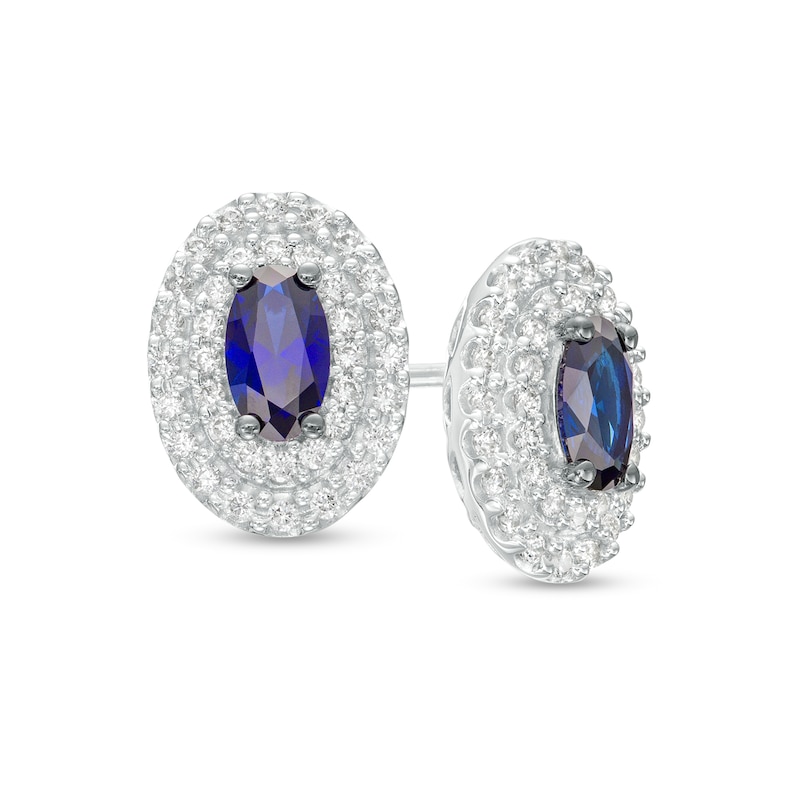 Vera Wang Love Collection Oval Blue Sapphire and 0.23 CT. T.W. Diamond Frame Stud Earrings in 10K White Gold|Peoples Jewellers